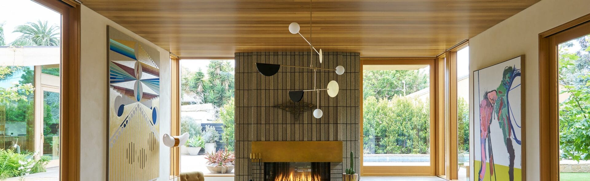 venice beach house living room with wood paneling